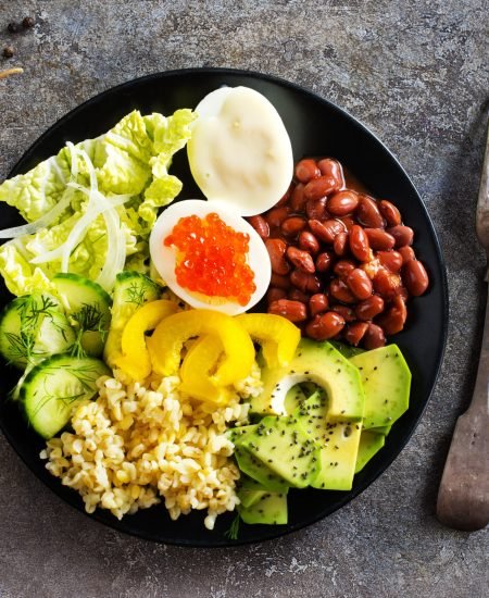 Buddha bowl, balanced food, vegetarian menu. Eggs, avocado, salad lettuce, bulgur