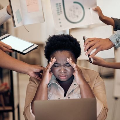Overwhelmed woman struggling with low energy and fatigue