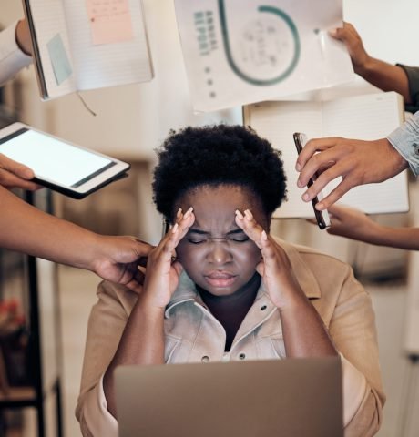 Overwhelmed woman struggling with low energy and fatigue